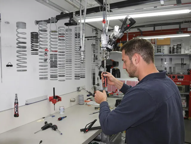 Kent Garage Door Repair safety certified technician performing precision spring replacement in Kent