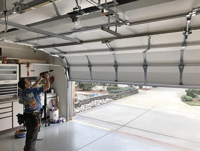 Garage door track repair service by Kent Garage Door Repair in Kent
